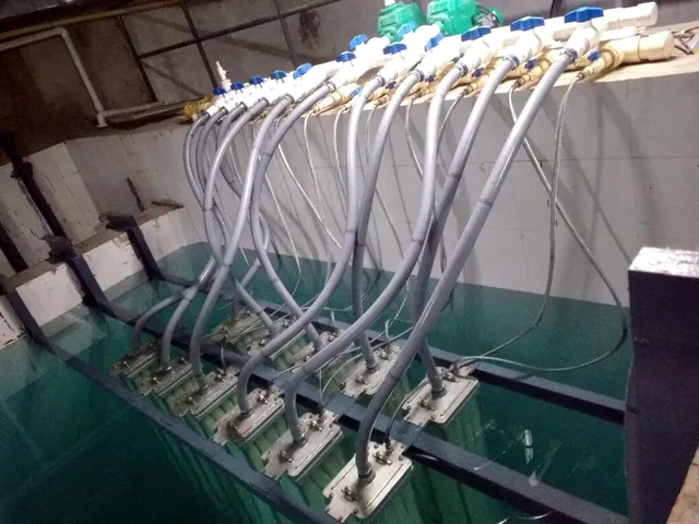 Membrane modules connected to a permeate manifold in an MBR tank