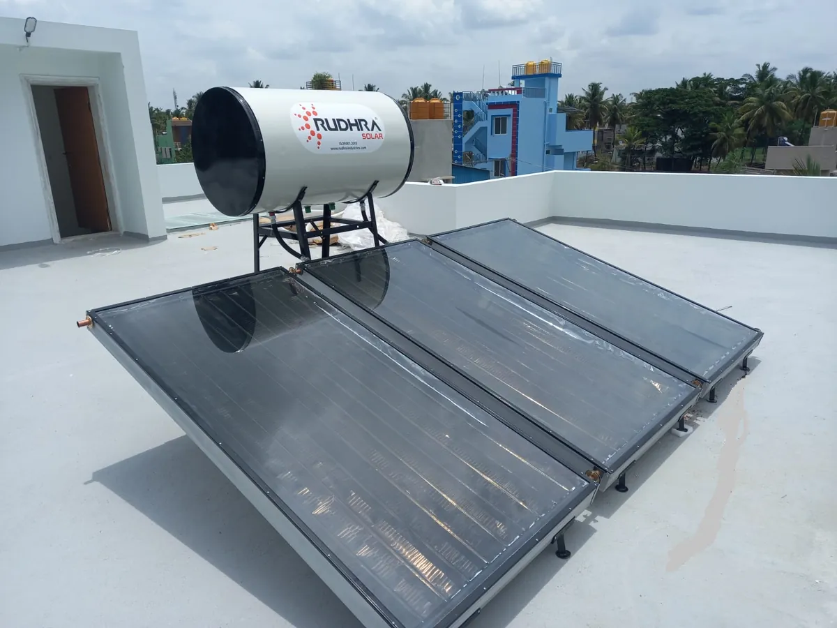 Rudhra Solar water heater with three flat plate collectors on a rooftop