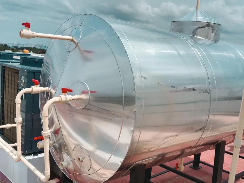 Rudhra Solar commercial storage tank with valved piping to heat pumps